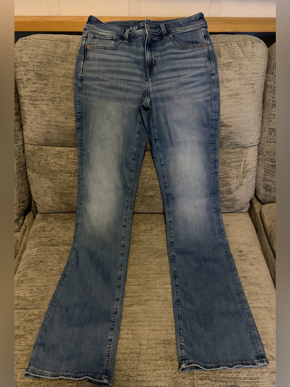 American Eagle Outfitters Next Level Stretch. Light Blue Kick Boot Jeans